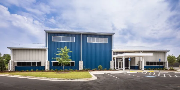 Blue pre-engineered building used as a training facility for Plumbers and Steam Fitters Union of the CSRA-Local 150