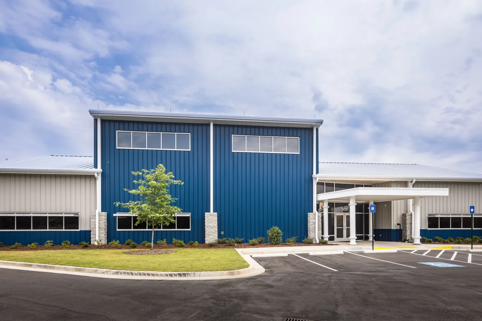 Blue pre-engineered building used as a training facility for Plumbers and Steam Fitters Union of the CSRA-Local 150