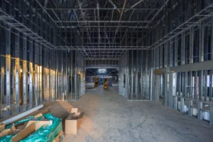 Photo shows construction of the school with just the steel beams